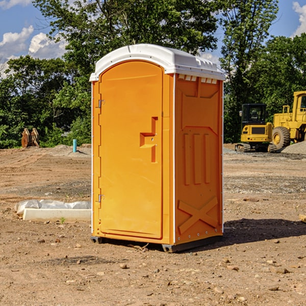 how often are the portable restrooms cleaned and serviced during a rental period in Shirland